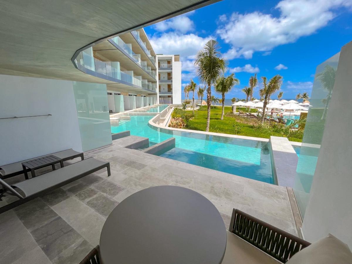 Serenity Club Kamer aan het Zwembad met Gedeeltelijk Uitzicht op de Oceaan 2 Junior Suite met Queensize Bedden